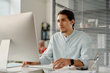 male-broker-analyzing-online-data-2025-03-17-04-05-44-utc (1).jpg